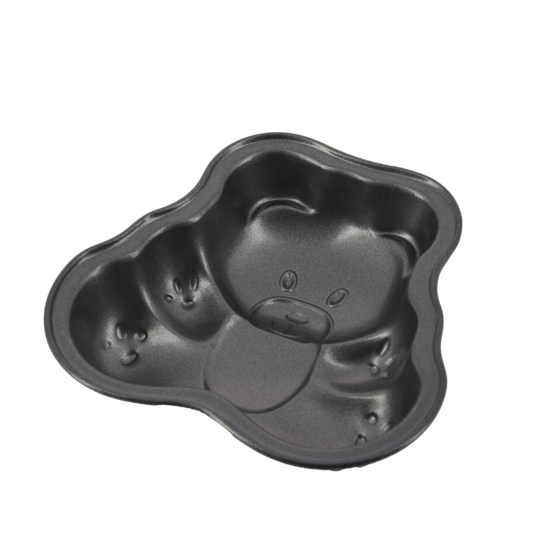 One dark grey cake mould in the shape of cartoon bears, showing the inside of the mould, on a white background.