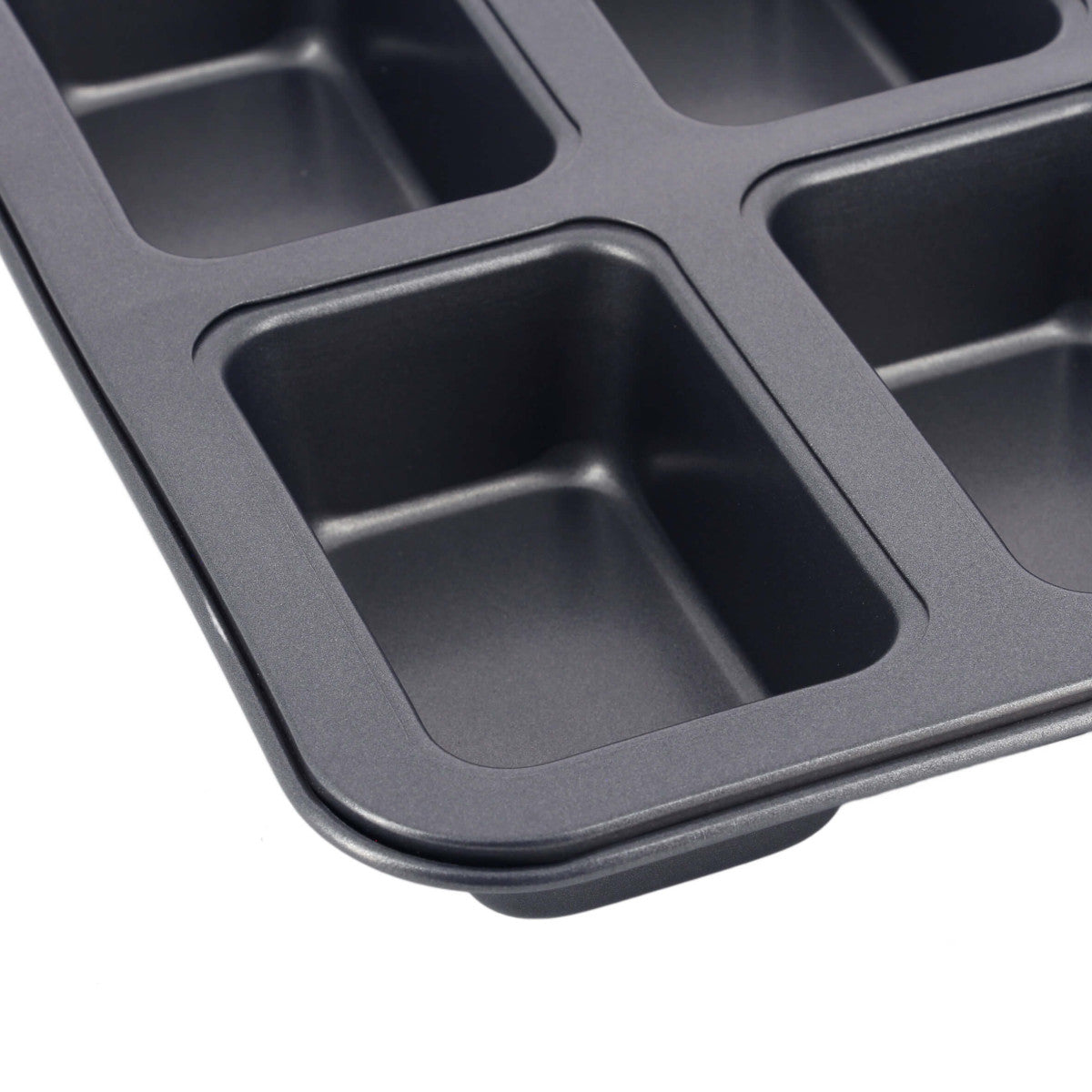 Close-up of the non-stick coating inside a cavity of the De Buyer eight-cavity mini cake tray