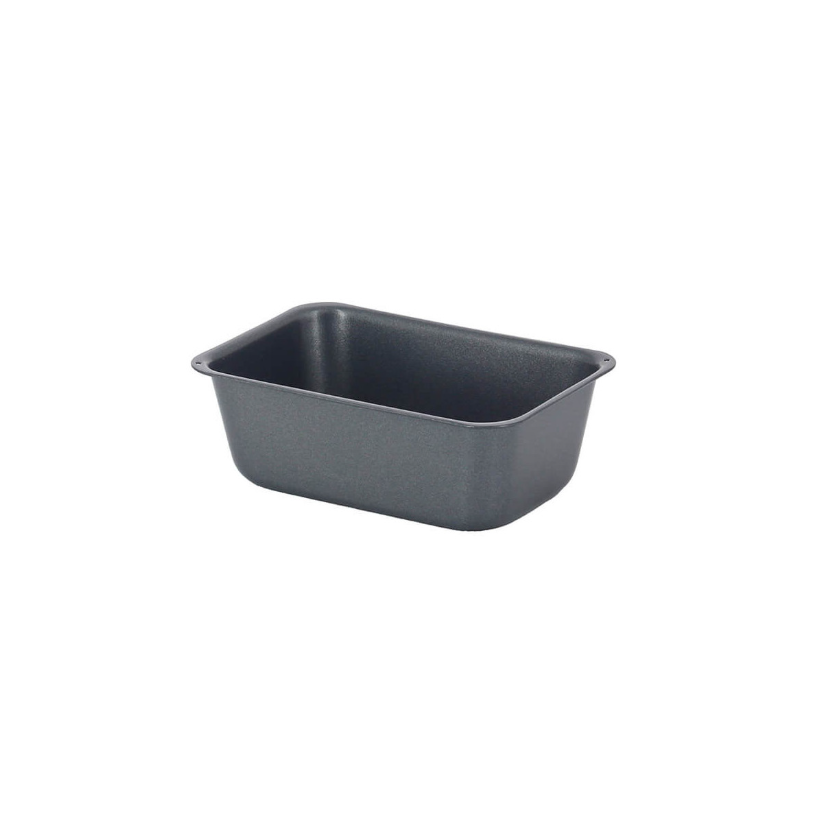 Single De Buyer mini loaf mould showing its non stick coating on a white background