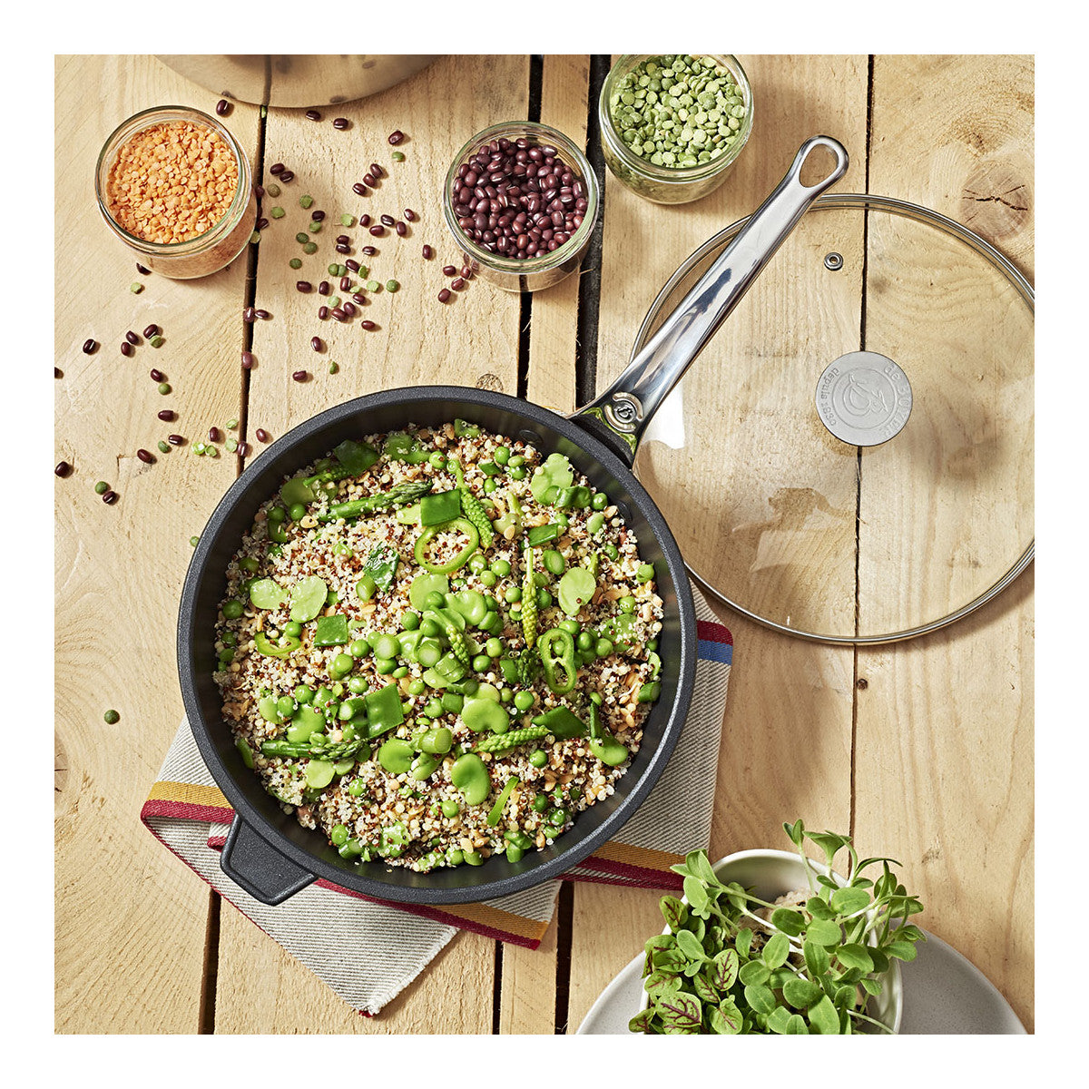 Food gently simmering in a non-stick sauté pan